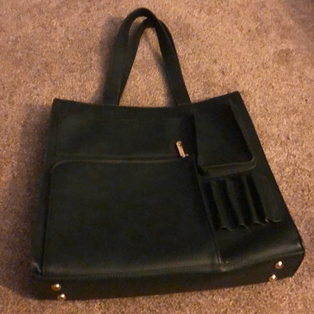 Brand new dark green leather tote. Shoulder strap